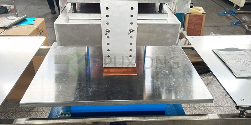 How does a traditional embossing machine work?